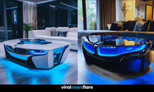 A sleek BMW-inspired aquarium coffee table with LED lighting and a vibrant aquatic display in a modern living room.