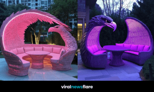 A stunning eagle-shaped outdoor seating arrangement with ambient LED lighting, featuring intricate rattan craftsmanship and plush cushions.