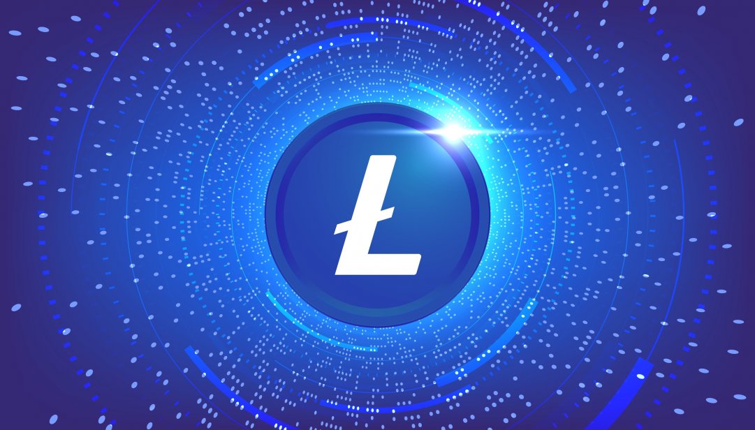 Glowing Litecoin ($LTC) digital coin with a futuristic blue background, symbolising cryptocurrency growth and blockchain technology.