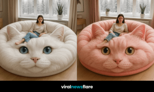 Woman relaxing on oversized white cat-shaped sofa with winter view through the window