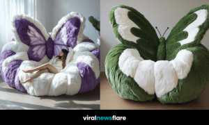 A woman relaxing on an oversized purple and white butterfly armchair in a bright modern room.