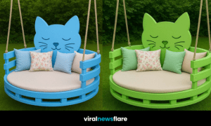 Cat-shaped outdoor swing chair with floral cushions in a green garden