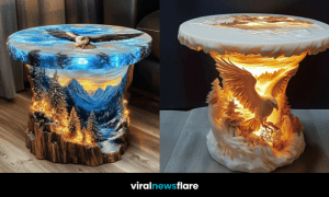 Artistic glowing eagle table with nature carvings and dramatic landscape design