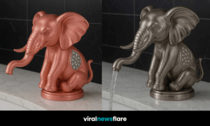 Elephant-shaped tap with water flowing from the trunk, placed on a marble counter in a modern bathroom