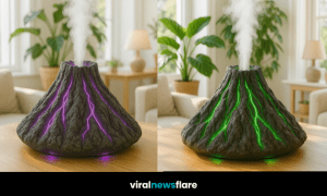 Decorative volcano-shaped aroma diffuser with colour-changing LED lava lighting and rising mist in a modern living room.