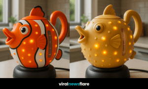 A collection of colourful fish-shaped kettles with LED lighting displayed in a modern kitchen setting.