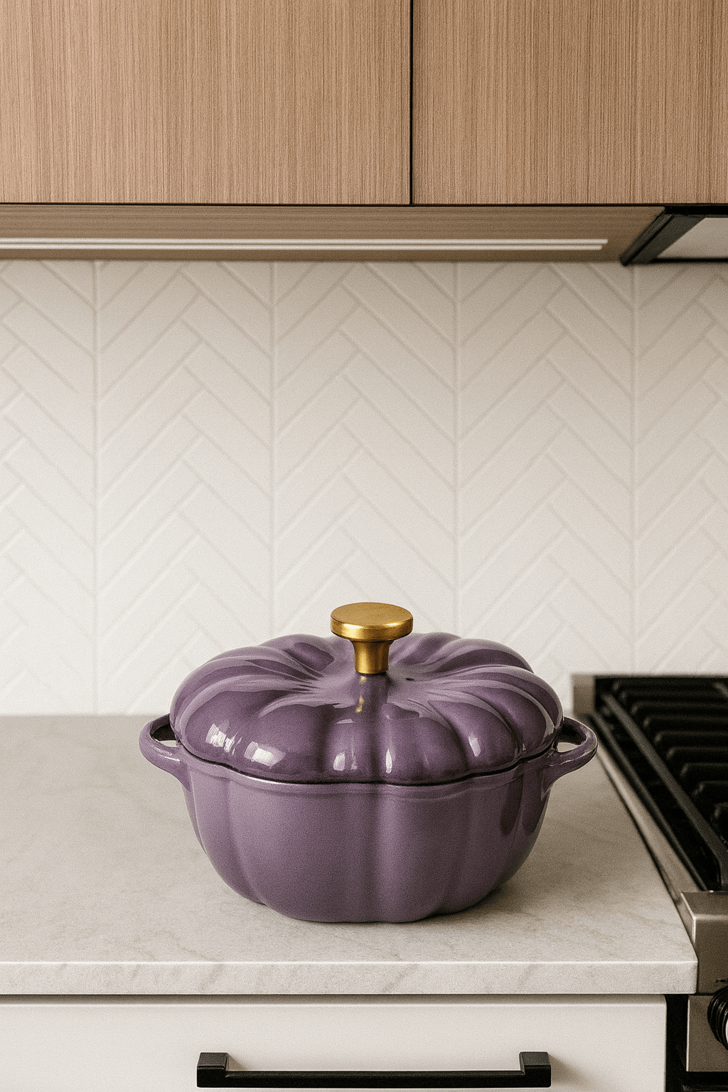 A lavender purple pumpkin casserole dish with a gold knob displayed on a modern light countertop.