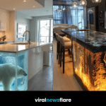 Decorative glowing winter-themed kitchen island with illuminated snow scenes and festive lighting.