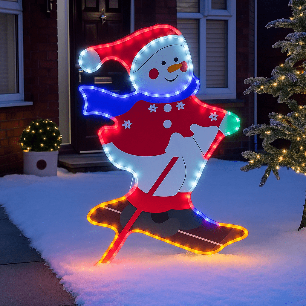 Illuminated snowman figure glowing in the snow outside a home with festive lighting.