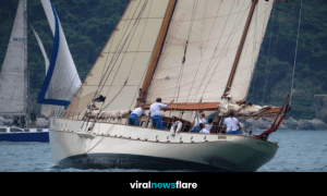 Ex-service personnel sailing aboard the historic 78ft yacht Rona during a veteran-led sailing experience at sea