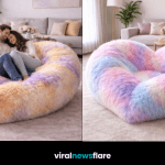 Heart-shaped plush lounge bed as a cosy statement seating piece in a modern home