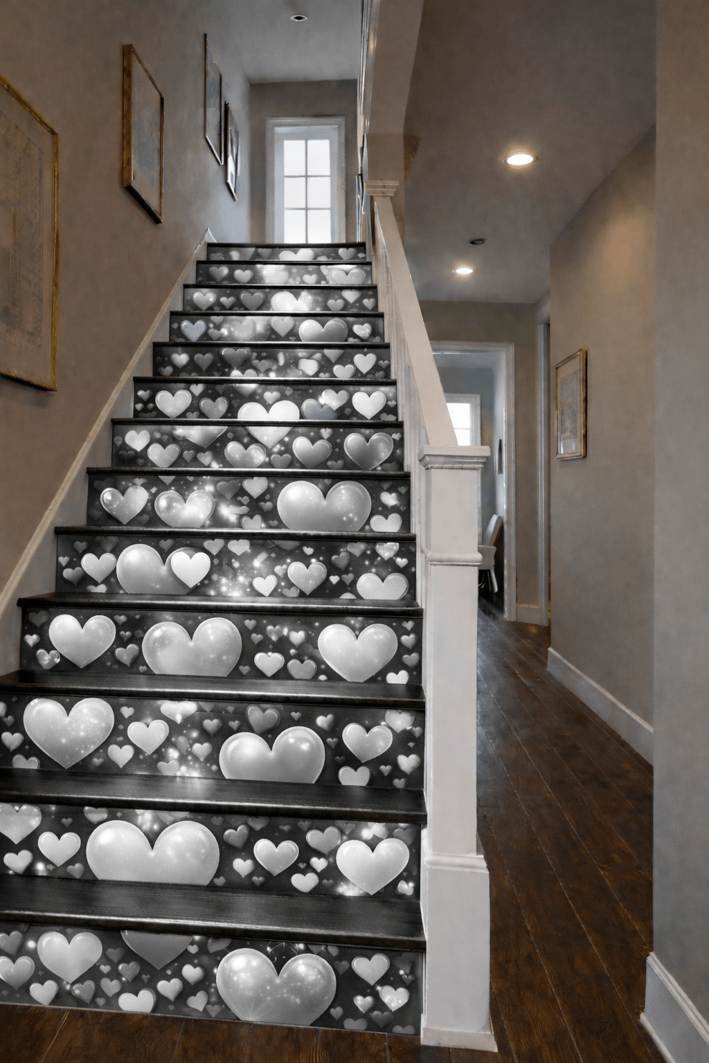 Black and white heart illusion staircase risers with soft glow lighting in a modern stairwell