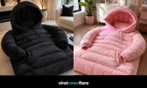 Oversized hoodie inflatable bed with giant sleeves, padded hood and drawstrings showcasing the cosy hoodie bed trend.