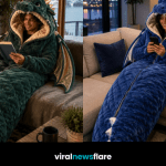 Oversized plush dragon sleeping bag featuring a padded dragon head, wings, scales and long tail for cosy fantasy-inspired relaxation.