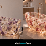 Luxury transparent floral bathtub filled with colourful flowers showcasing the floral bathtub interior design trend