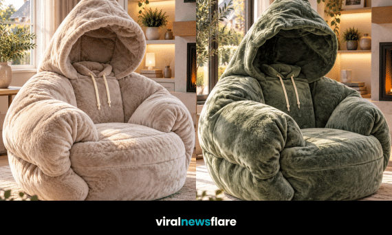 Oversized plush hoodie chair with padded sleeves, large hood and drawstrings creating a cosy statement furniture design