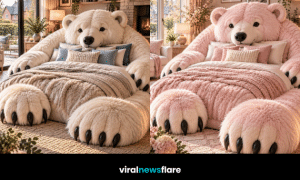 Giant fluffy bear-shaped bed with oversized paws and cosy bedding showcasing the giant bear bed interior trend